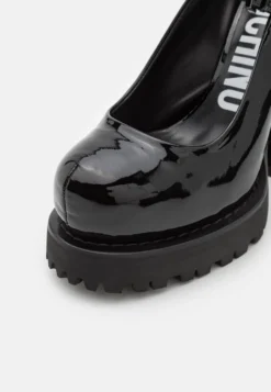 MOSCHINO Plateaupumps - Nero -Damesschoenen 0cfaa1150444443298707919cdffe08f scaled