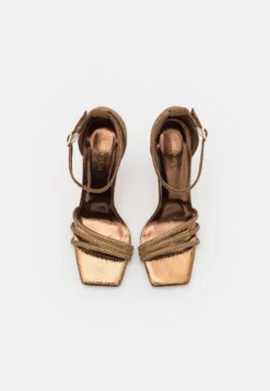 Menbur Sandalen Met Hoge Hak - Bronze -Damesschoenen 2e34e697494e4893a54366cce7edad38 scaled